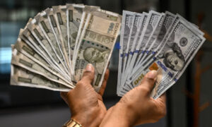 Rupee Plunges to Record Low Against US Dollar